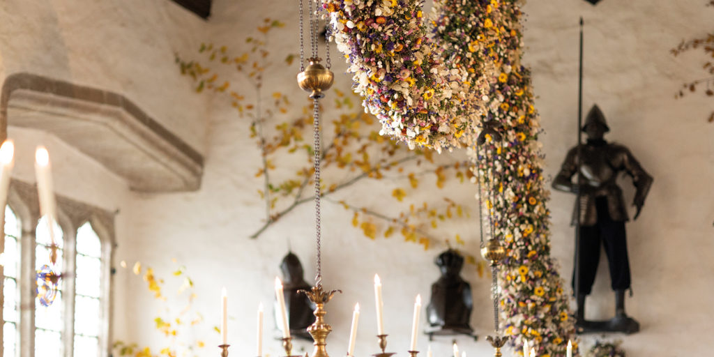 The Christmas garland on display in the Great Hall at Cotehele