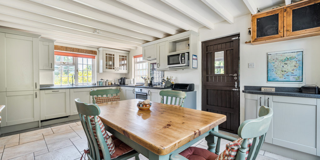 Lizard Peninsula property for sale with countryside views near the Helford River. Country house for sale Cornwall set within landscaped gardens on the Lizard Peninsula. Four bedroom house for sale near Helford Cornwall with rural views and private grounds. Luxury property Lizard Peninsula Cornwall offering south facing gardens and terrace. Family home for sale Cornwall with open plan kitchen, conservatory and countryside outlook. Character home for sale near Helford River with inglenook fireplace and wood burner. Detached house for sale Lizard Peninsula Cornwall with orchard and landscaped gardens. Cornwall countryside property for sale near the Helford with parking and outbuildings. Lizard Peninsula home for sale with panoramic rural views and modern interiors. Jackson Stops Cornwall property for sale near Helford River and the Lizard coast. Country home Cornwall with four bedrooms, conservatory and sun terrace. Detached family house for sale Cornwall with generous driveway and mature gardens. Property for sale near Helford Cornwall combining character features and contemporary living. Lizard Peninsula residential property for sale in peaceful countryside setting. Cornwall estate agents Jackson Stops marketing homes on the Lizard Peninsula.